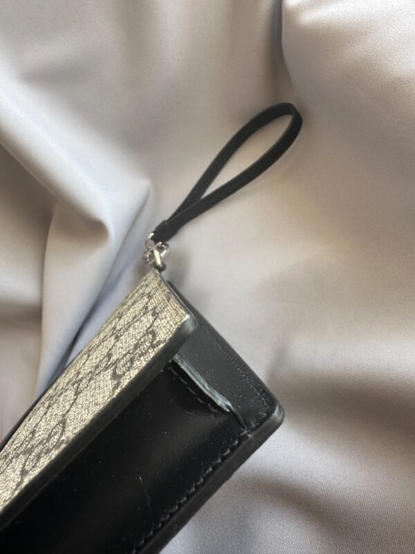 Gucci Supreme Canvas Eden Clutch (2017)