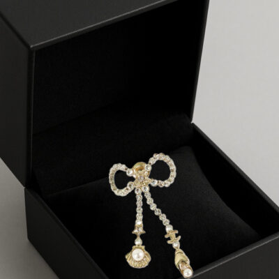 Chanel Gold Plated Rhinestone Ribbon Marine Brooch (2025)